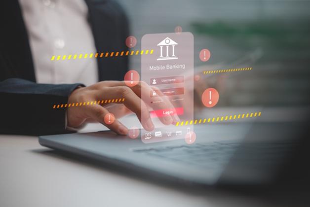 Koncepcja zagrożenia cybernetycznego w bankowości mobilnej. Ekran logowania do aplikacji bankowej otoczony symbolami wykrzykników i pasami ostrzegawczymi, sugerującymi ryzyko lub próbę phishingu.